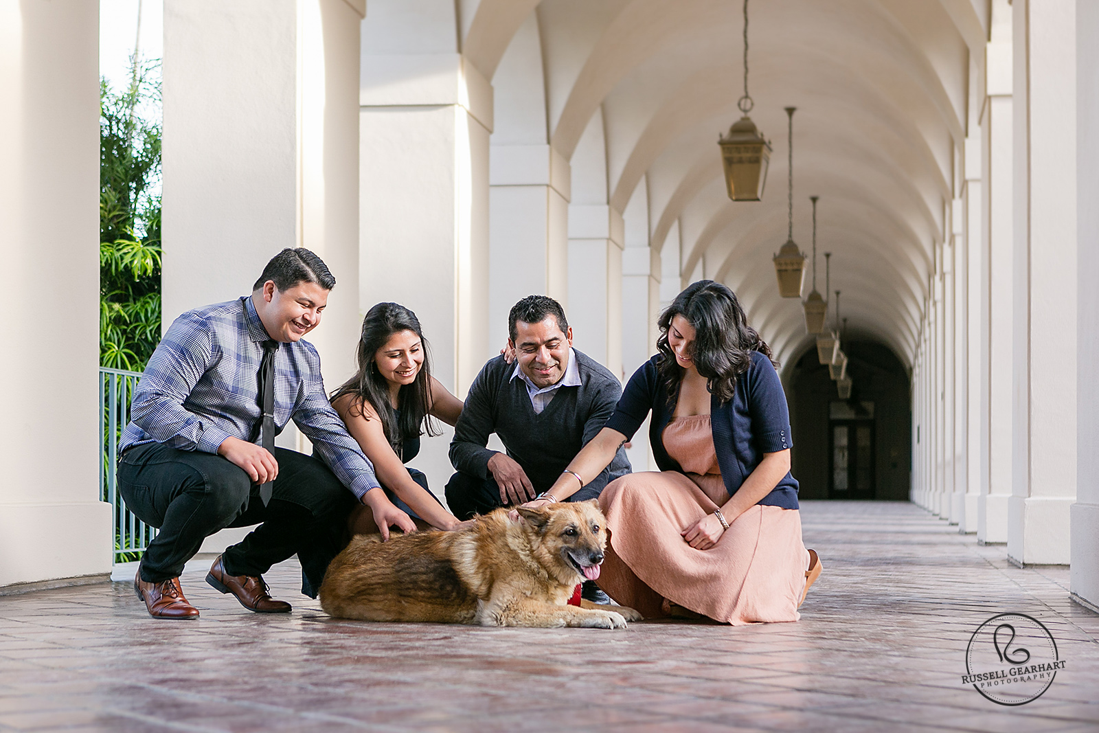 Family petting dog - Pasadena City Hall Family Portraits – Russell Gearhart Photography – www.gearhartphoto.com