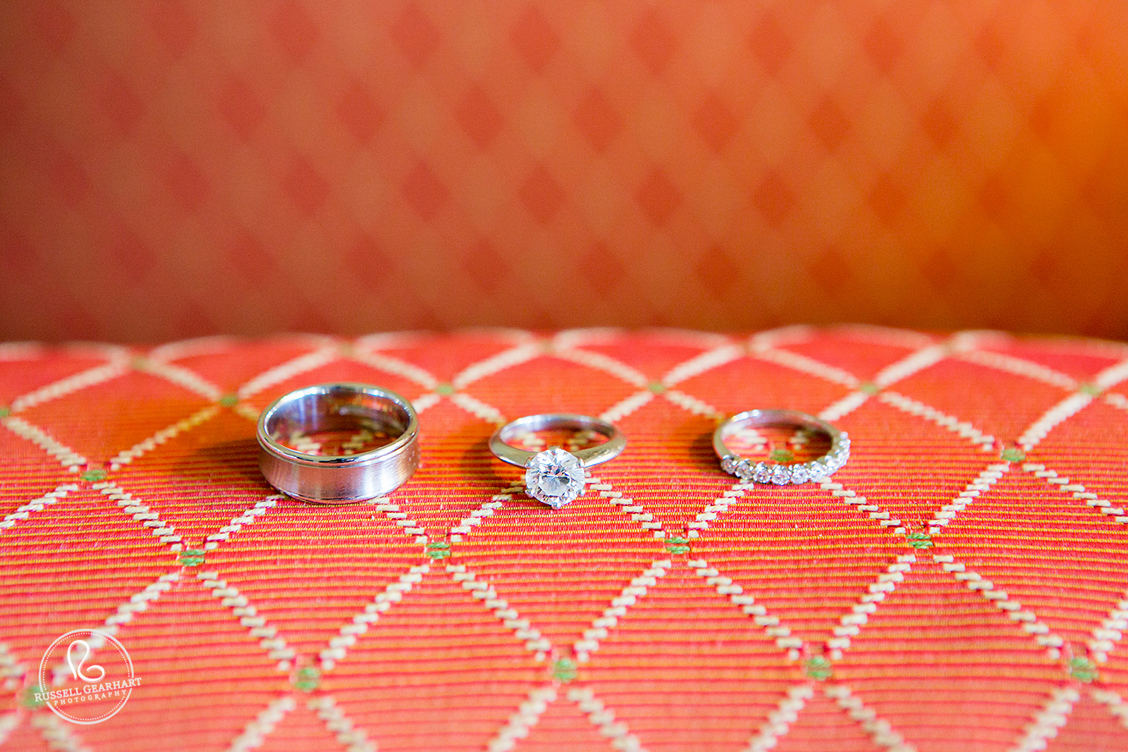 Wedding Rings on Orange Pillow – Pueblo Bonito Sunset Beach Wedding – Russell Gearhart Photography – www.gearhartphoto.com