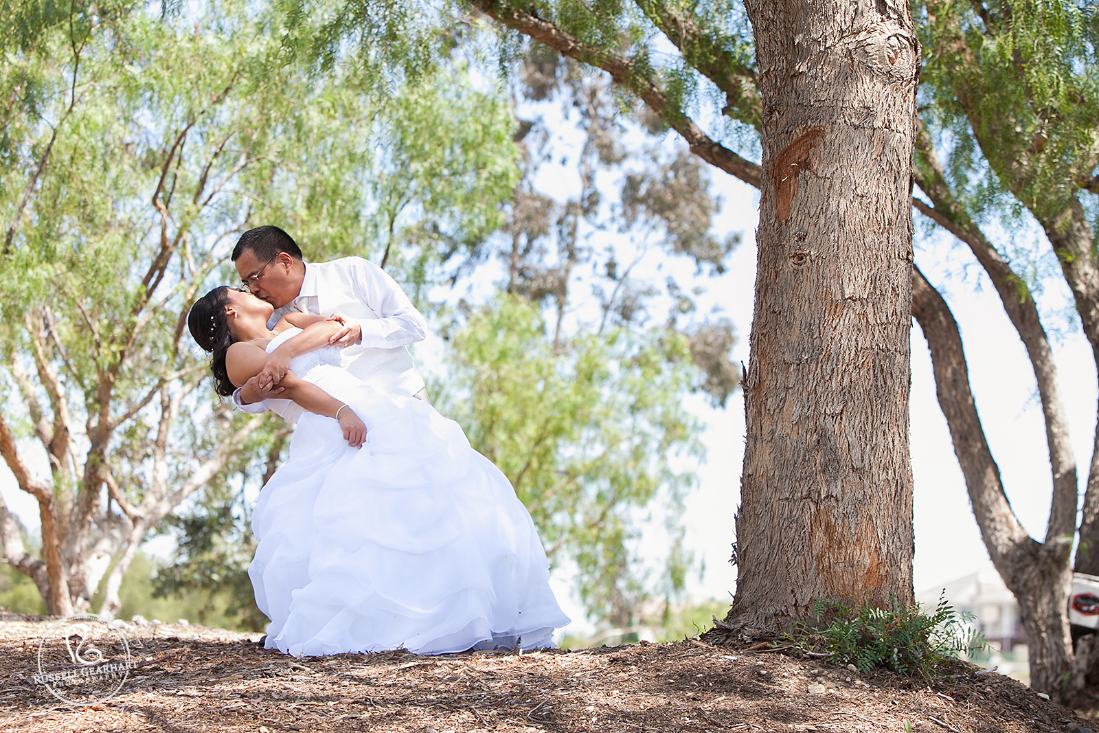 Dipping the Bride - Outdoor Orange County Wedding – Russell Gearhart Photography – www.gearhartphoto.com