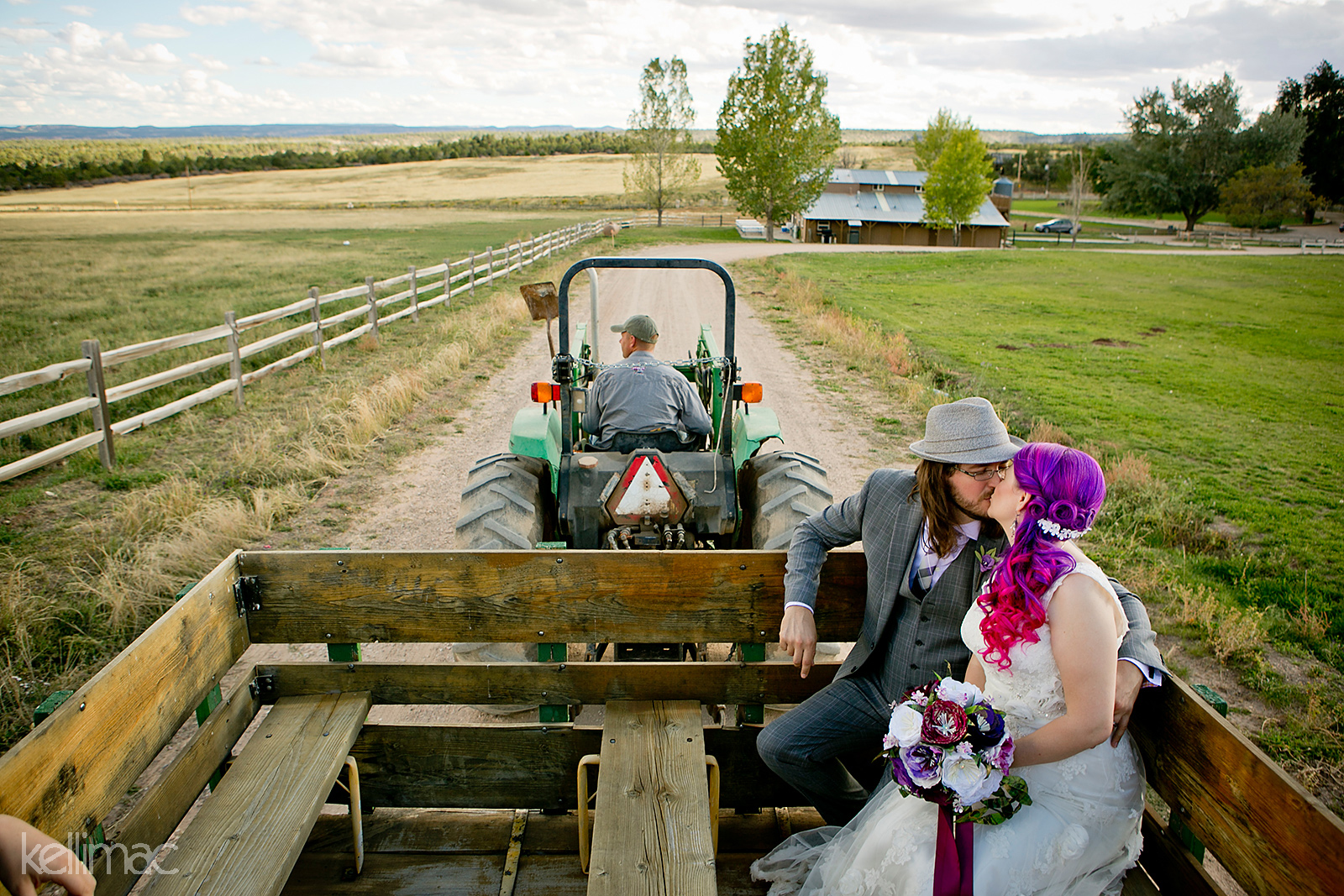 Hayride to the Reception - Clear Creek Family Ranch Wedding Southern Utah - Photos by Kelli Maguire - www.kellimac.com